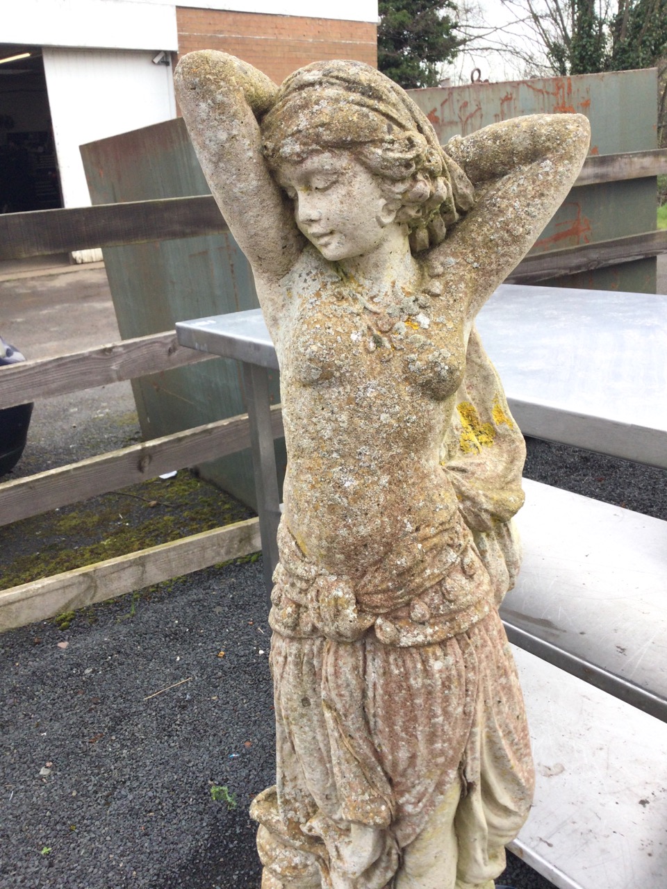 An art nouveau style composition stone garden statue of an elegant lady standing by urn on - Image 3 of 3