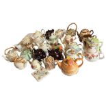 A collection of ceramic teapots, Victorian, Edwardian and later, including brown bettys,
