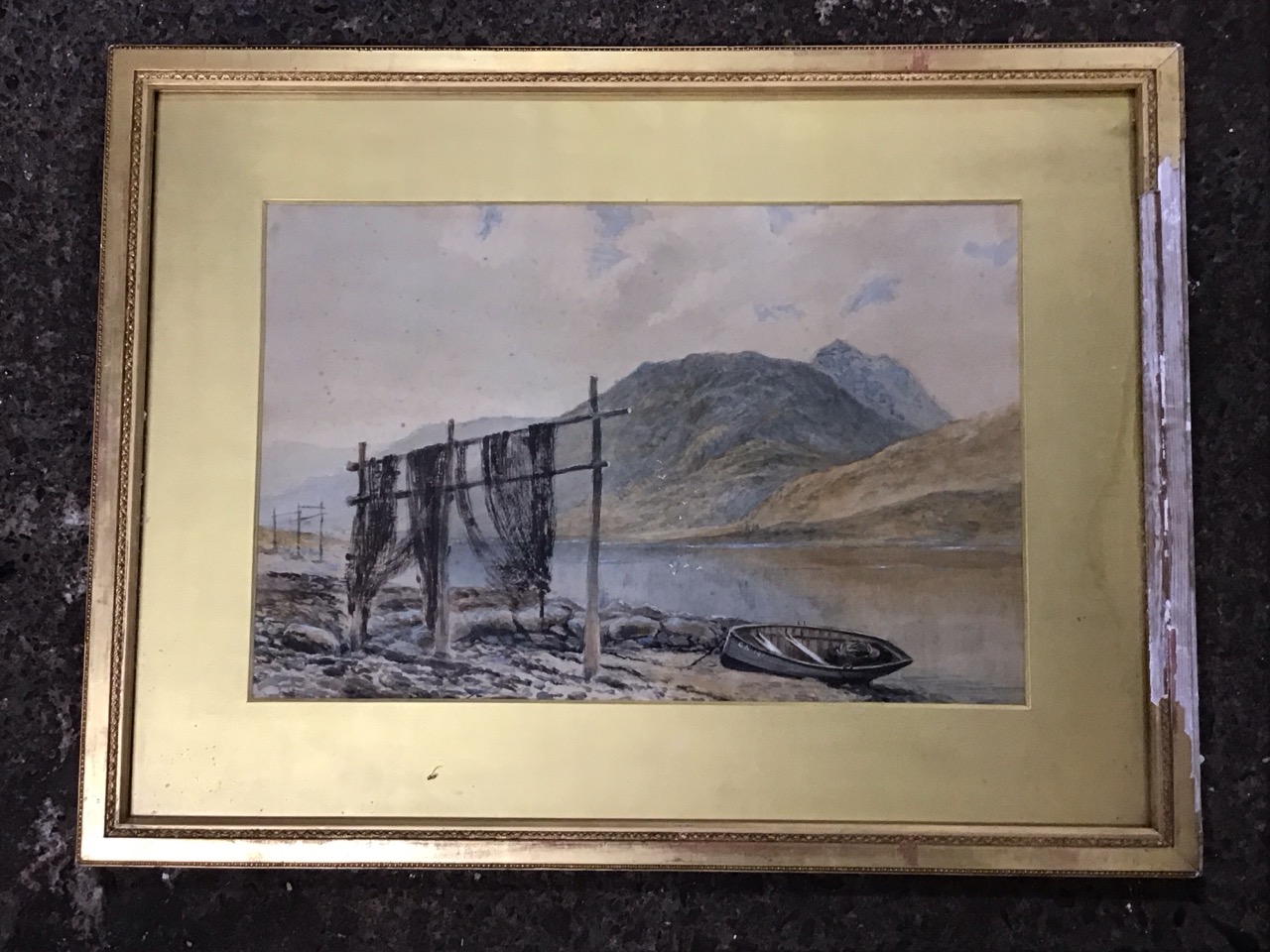 A Victorian watercolour, fishing boat and nets on the shore of a loch, unsigned, gilt mounted &