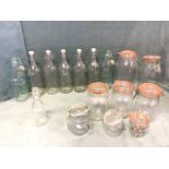 Eight Kilner style storage jars with rubber sealed covers; and eight ceramic sprung stoppered