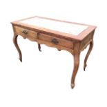 A French Louis XV provincial style pine and walnut side table, the rectangular top inset with