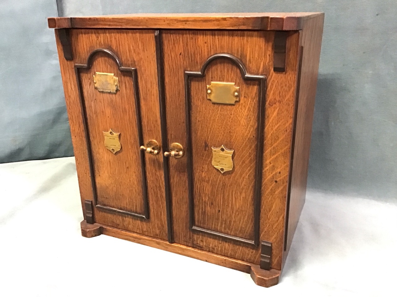 A Victorian oak cabinet modelled as a safe with ebonised panels to doors having brass mounts, the - Image 3 of 3