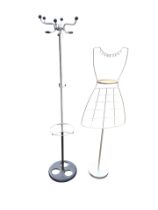 A chromed tubular coat stand with six hooks above a circular stick rail on pierced base - 64.25in;