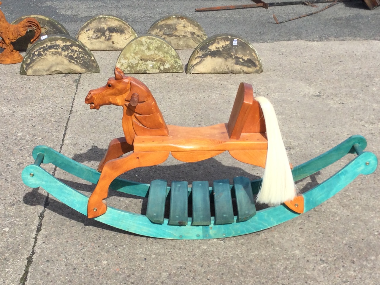 A contemporary pine rocking horse with carved head, glass eyes. horsehair tail and painted curved - Image 2 of 3