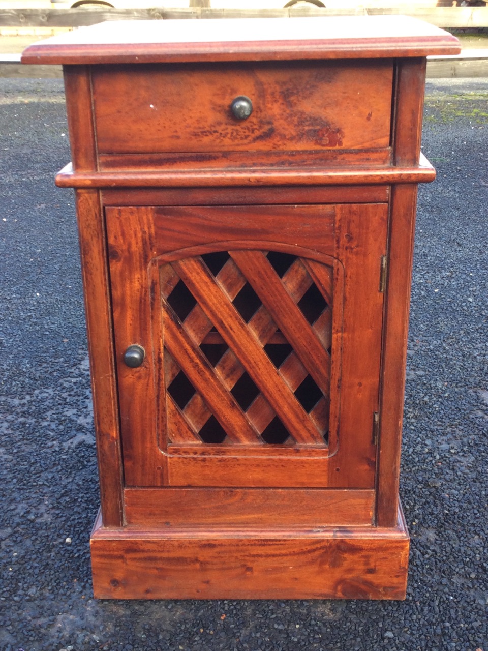 A mahogany bedside cabinet, the moulded rectangular top above a frieze drawer and lattice panelled - Image 3 of 3