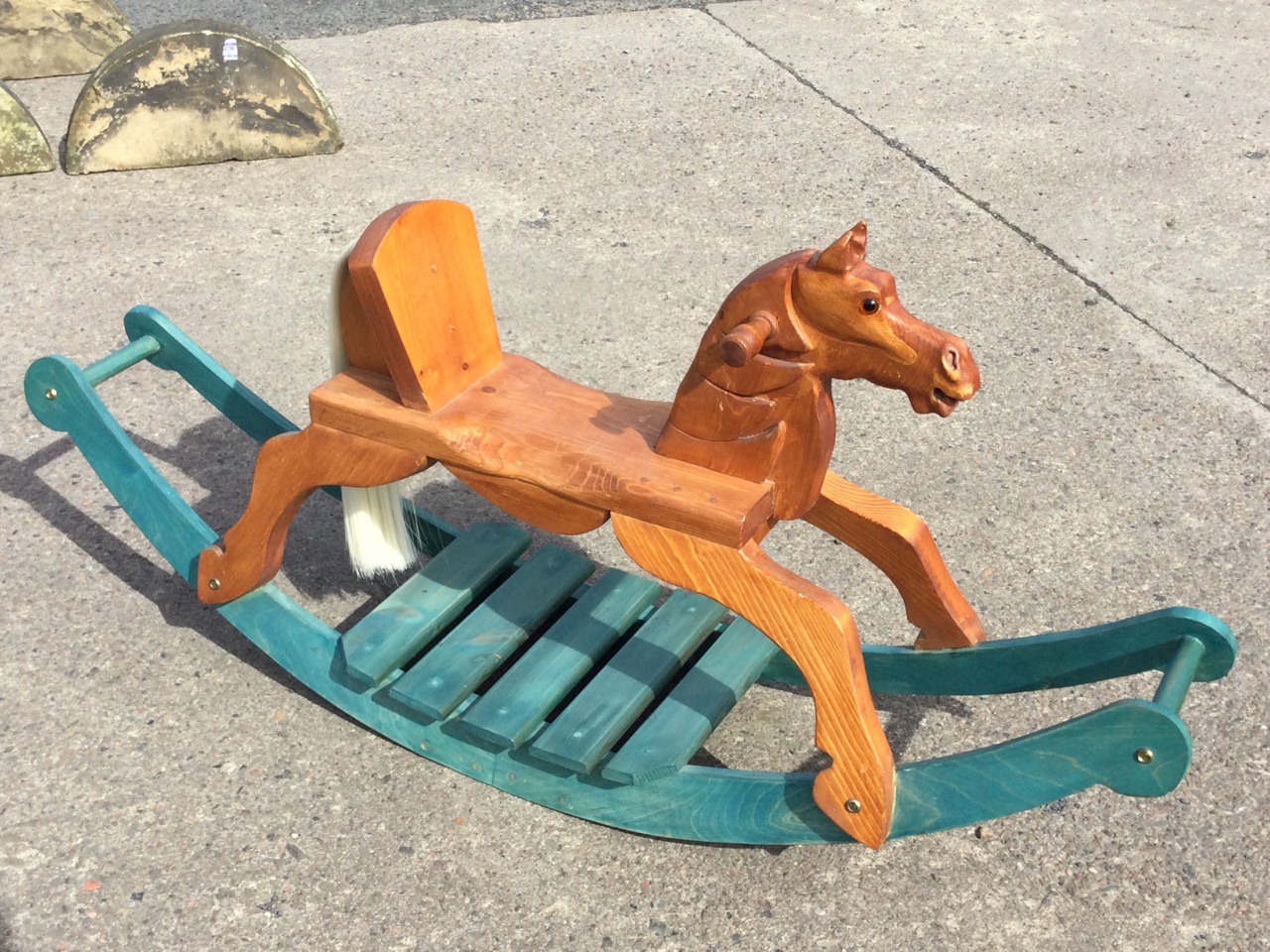 A contemporary pine rocking horse with carved head, glass eyes. horsehair tail and painted curved - Image 3 of 3