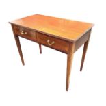 An Edwardian mahogany Georgian style side table with rectangular reeded edge top above two frieze