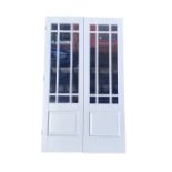 A pair of painted French doors with astragal glazed panels fitted with bevelled panes above