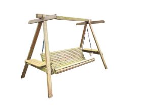 A swinging garden seat with six foot hanging slatted bench on chains, the triangular supports with