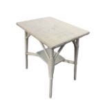 A Lloyd Loom style painted occasional table with rectangular top raised on bracketed cylindrical