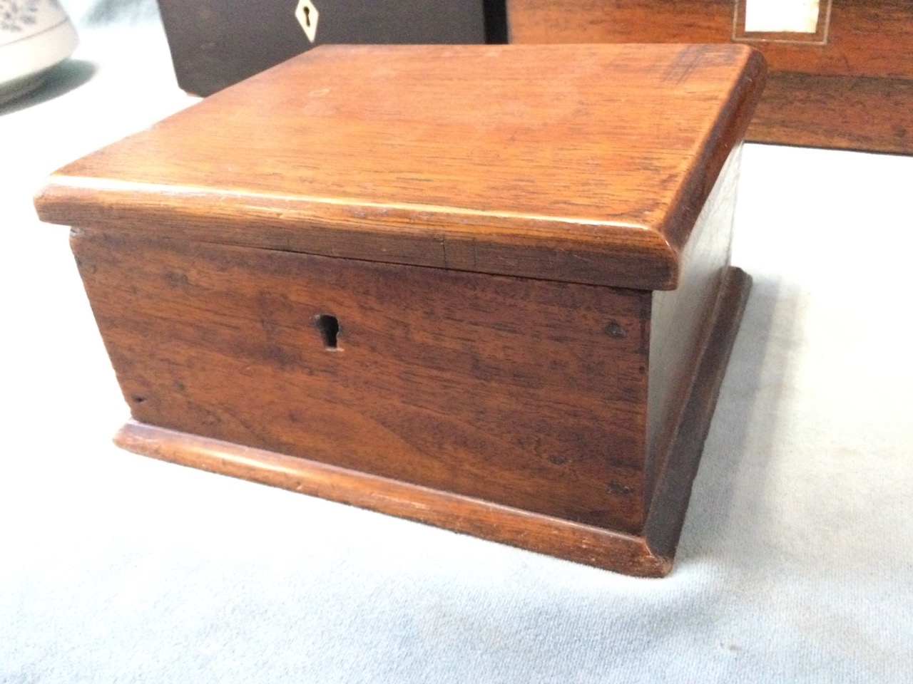 A Victorian ebony tea caddy with floral marquetry top; a rectangular C19th rosewood box with - Image 3 of 3