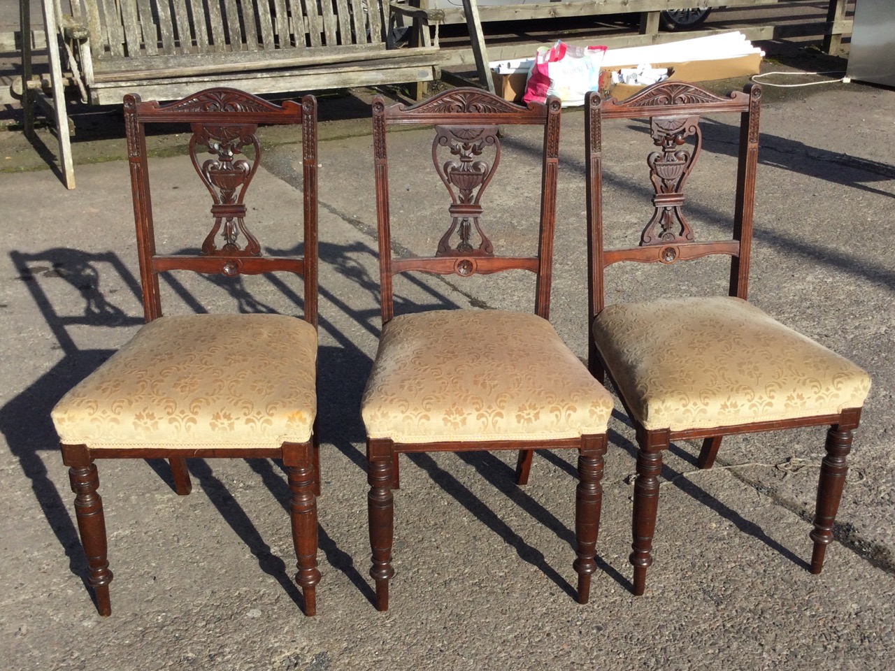 A set of three Edwardian mahogany chairs with carved arched backs and pierced vase foliate carved - Image 2 of 3