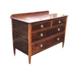 An Edwardian mahogany chest having two short and two long ebony & boxwood strung drawers with