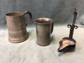 A Victorian pewter quart tankard with turned bands & engraved initials; an antique pewter flared