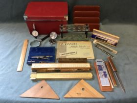 Miscellaneous desk accessories - a marble pen rack, a leather letter stand, a map mileage gauge, a
