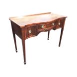 A regency style serpentine fronted mahogany side table by Charles Lowe & Sons of Loughborough with