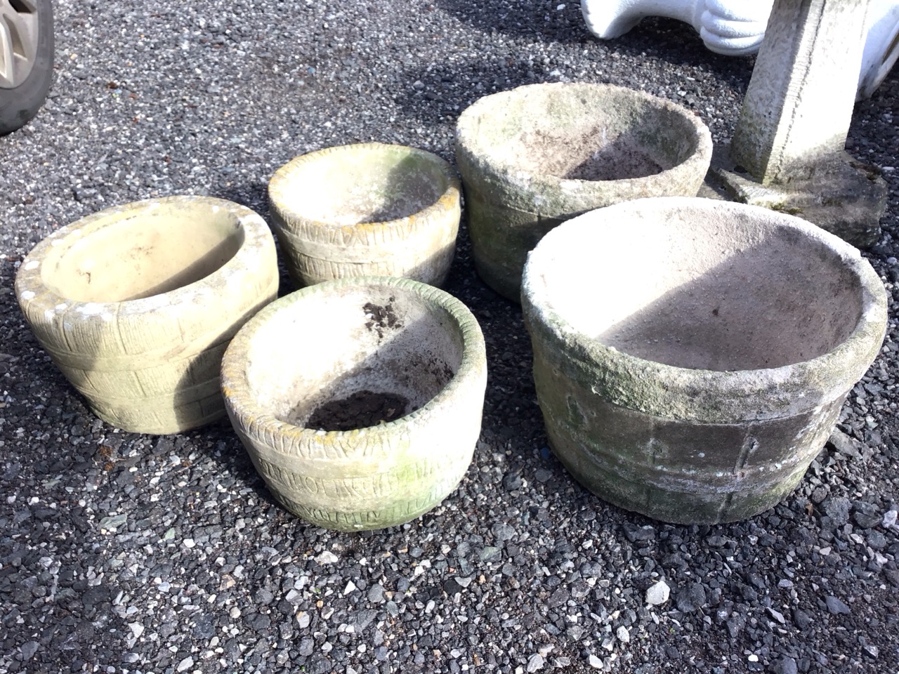 A pair of composition stone garden tubs cast as barrels with ring bands; another similar smaller - Image 2 of 3
