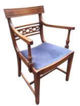 A mahogany regency style armchair with moulded tablet back and pierced lattice rail above a