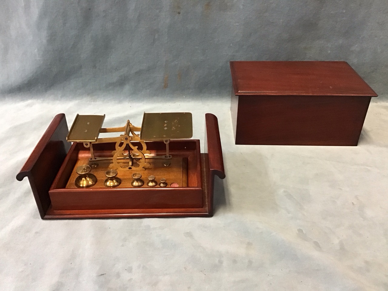 A Victorian set of brass postal scales in mahogany case with brass balance on pierced scrolled - Image 2 of 3