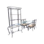 A wrought iron and glass dining room suite, with rounded rectangular bevelled glass topped table