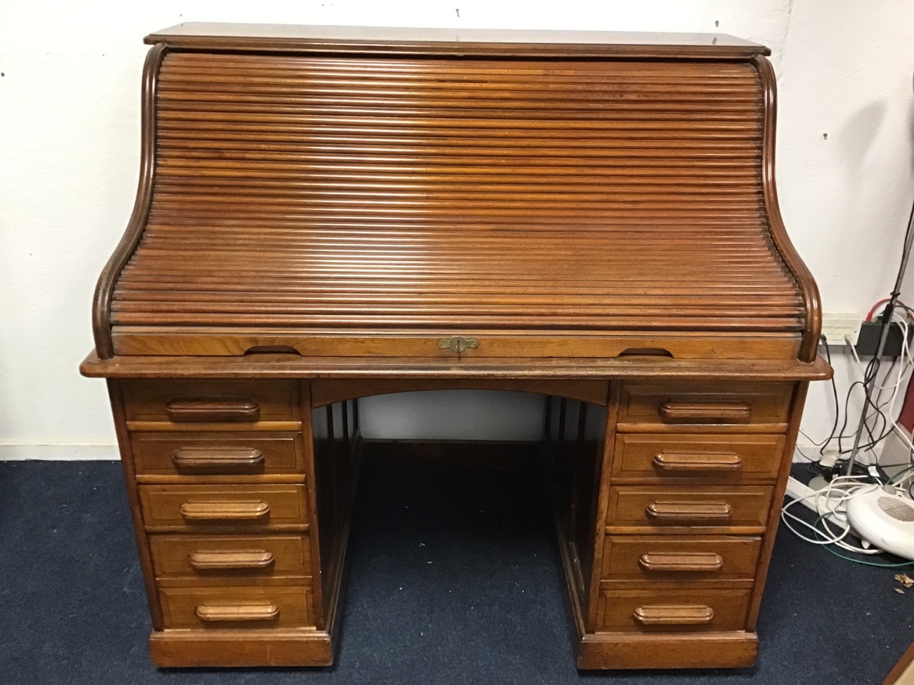 An Edwardian mahogany rolltop desk with panelled sides and tambour front enclosing pigeonholes and - Image 2 of 3