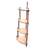 A Victorian walnut four-tier corner whatnot with inlaid scrolled decoration to bowfronted shelves,