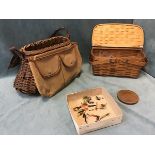 A cane fishing creel with leather strap, canvas cover and pockets; a woven wood lath egg basket with