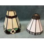 A Tiffany style pentagonal leaded glass lampshade decorated with floral motifs - 6.5in; and