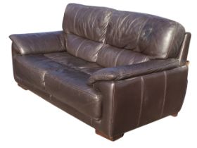 A contemporary Violino leather two-seater sofa, the rectangular back and seat flanked by sloped