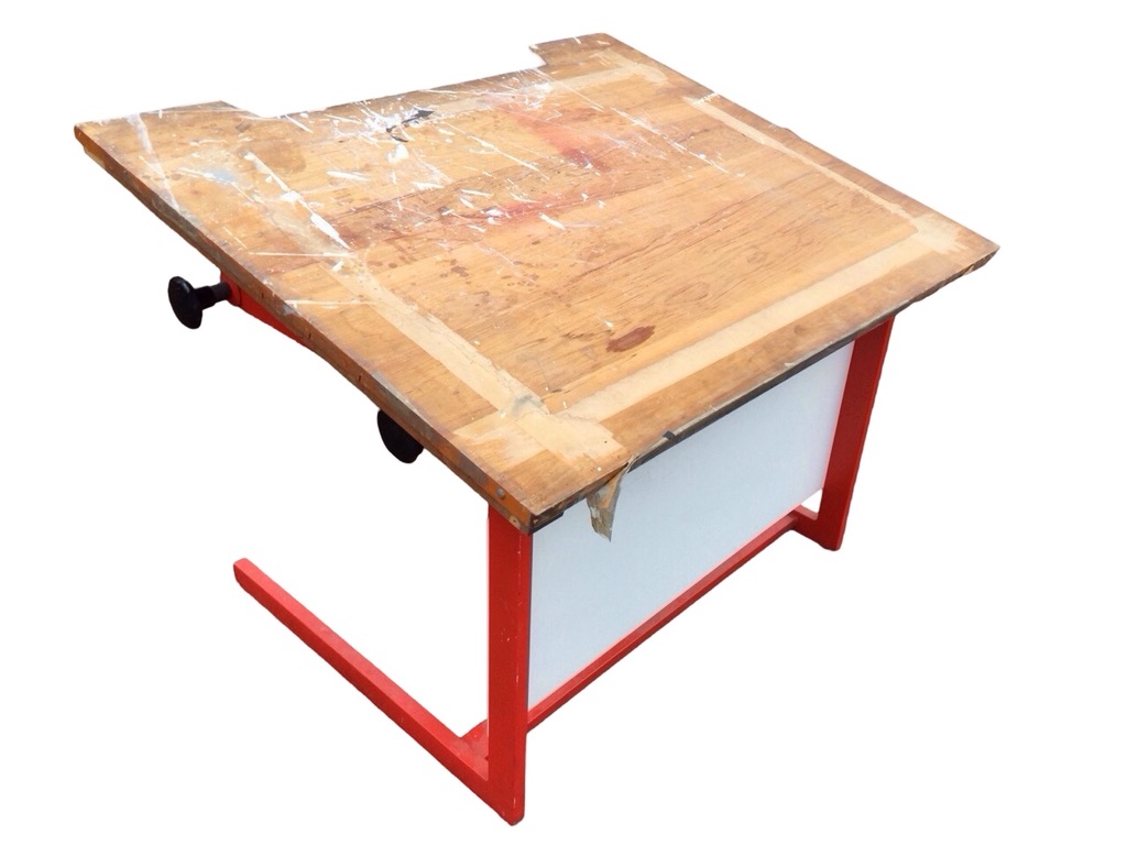 A pine drawing board on adjustable painted metal stand. (42.25in x 35.5in)