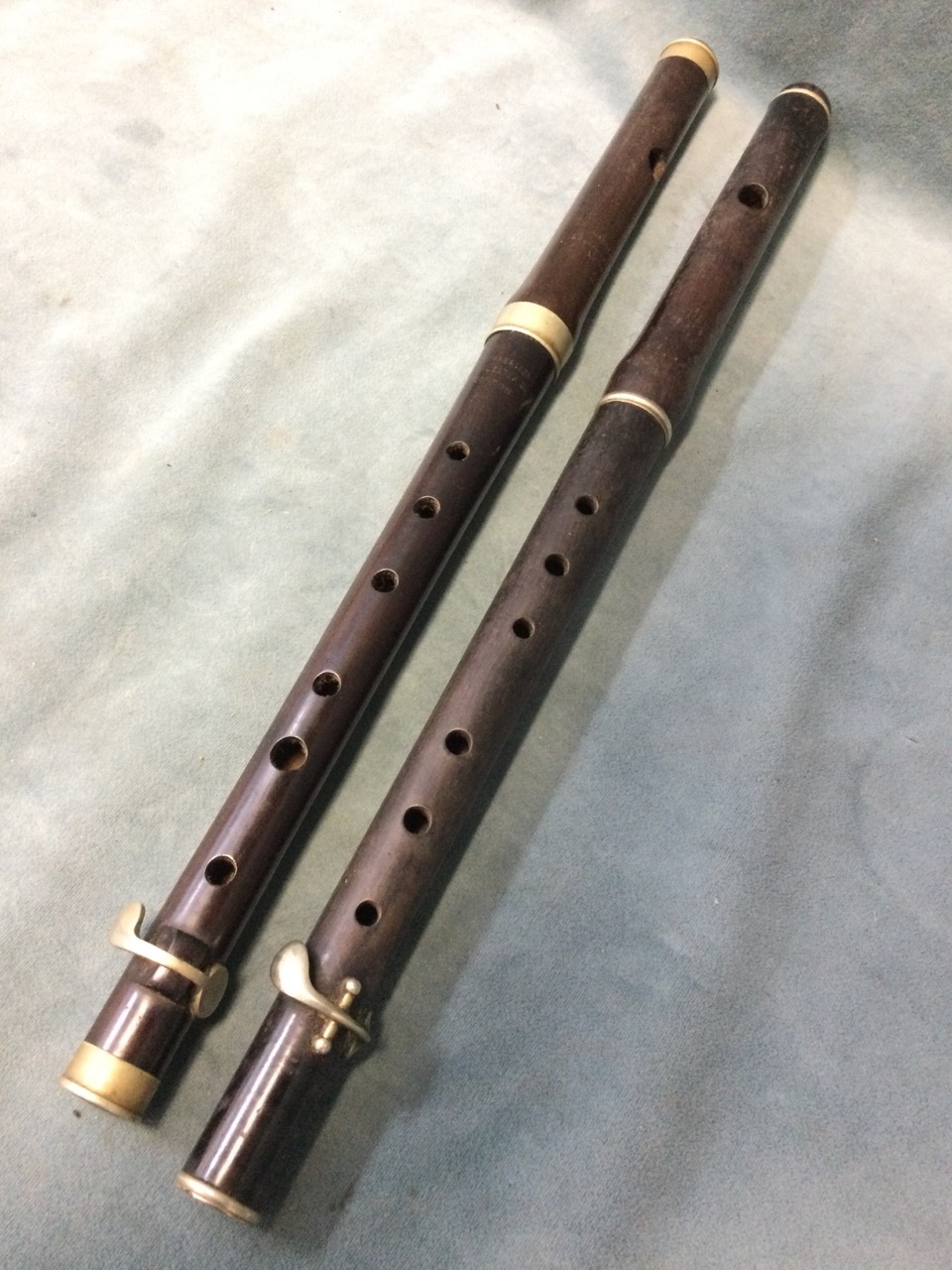 A cased Hawks & Son rosewood piccolo; another similar rosewood instrument by Hawkes; and a third - Image 3 of 3