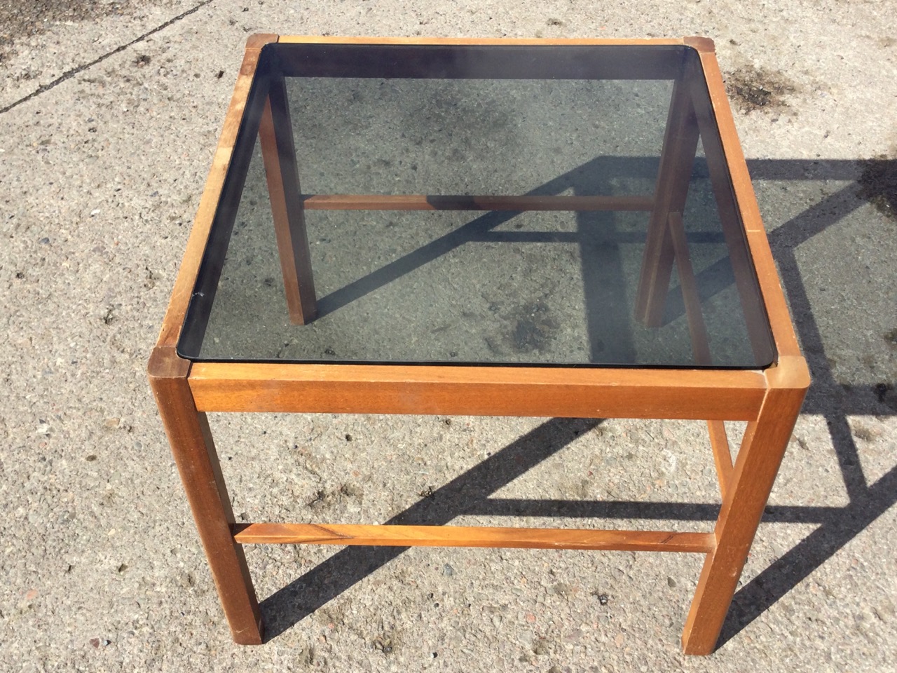 A 70s square mahogany coffee table with smoked glass top raised on chamfered and grooved square legs - Image 2 of 3