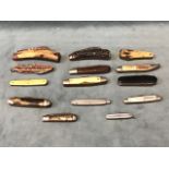 A collection of penknives - bone, antler horn, mother-of-pearl, wood and steel handled examples, a