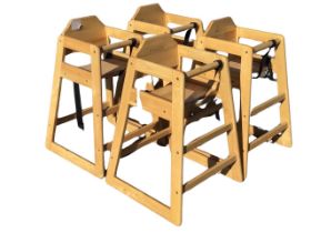 Four contemporary hardwood stacking high chairs, the solid backs and seats with retaining bars and