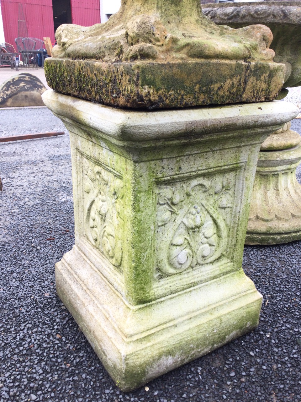 A composition stone garden urn on stand, with scalloped leaf moulded pot on square base with - Image 3 of 3