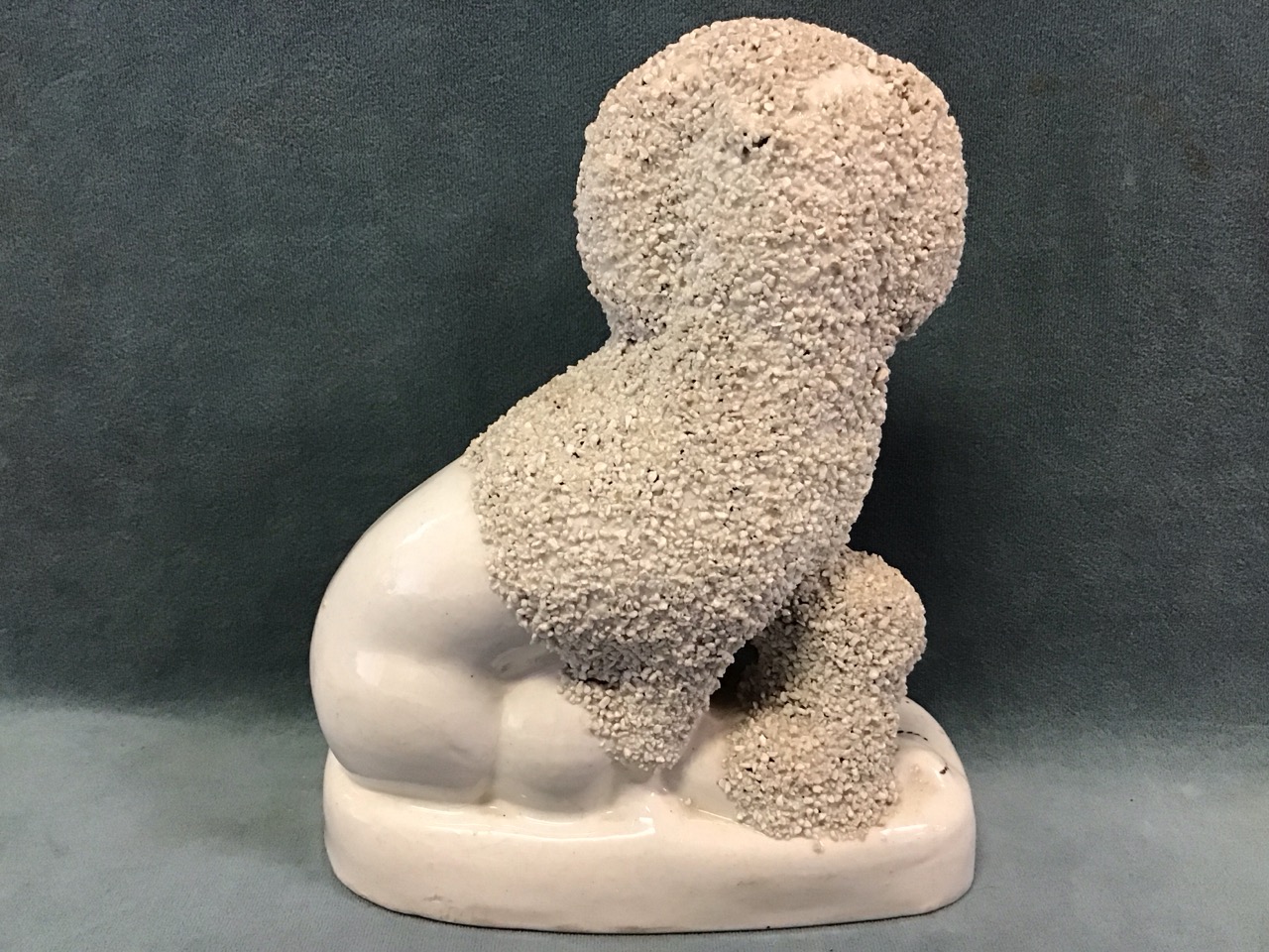 A pair of Victorian Staffordshire flatback ceramic seated poodles, each with two puppies. (6. - Image 3 of 3