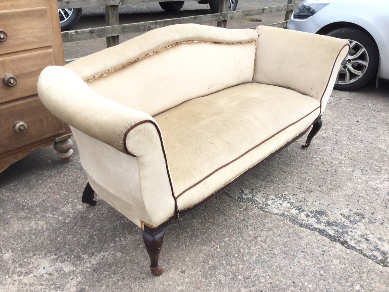 An Edwardian upholstered sofa with arched rolled back and rectangular sprung seat flanked by - Image 3 of 3