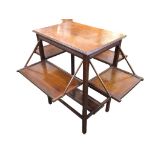 An Edwardian mahogany occasional table with rectangular moulded top above four fold-out trays raised