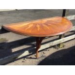 A mahogany & oak folding demi-lune console table with sunburst inlaid moulded top supported on a