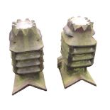 A pair of Edwardian salt glazed stoneware ridge chimney vents with oval crown tops above rectangular