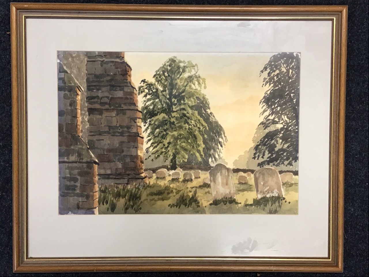 Peter J Clarke, watercolour, a churchyard with trees in evening sunlight, signed & dated,