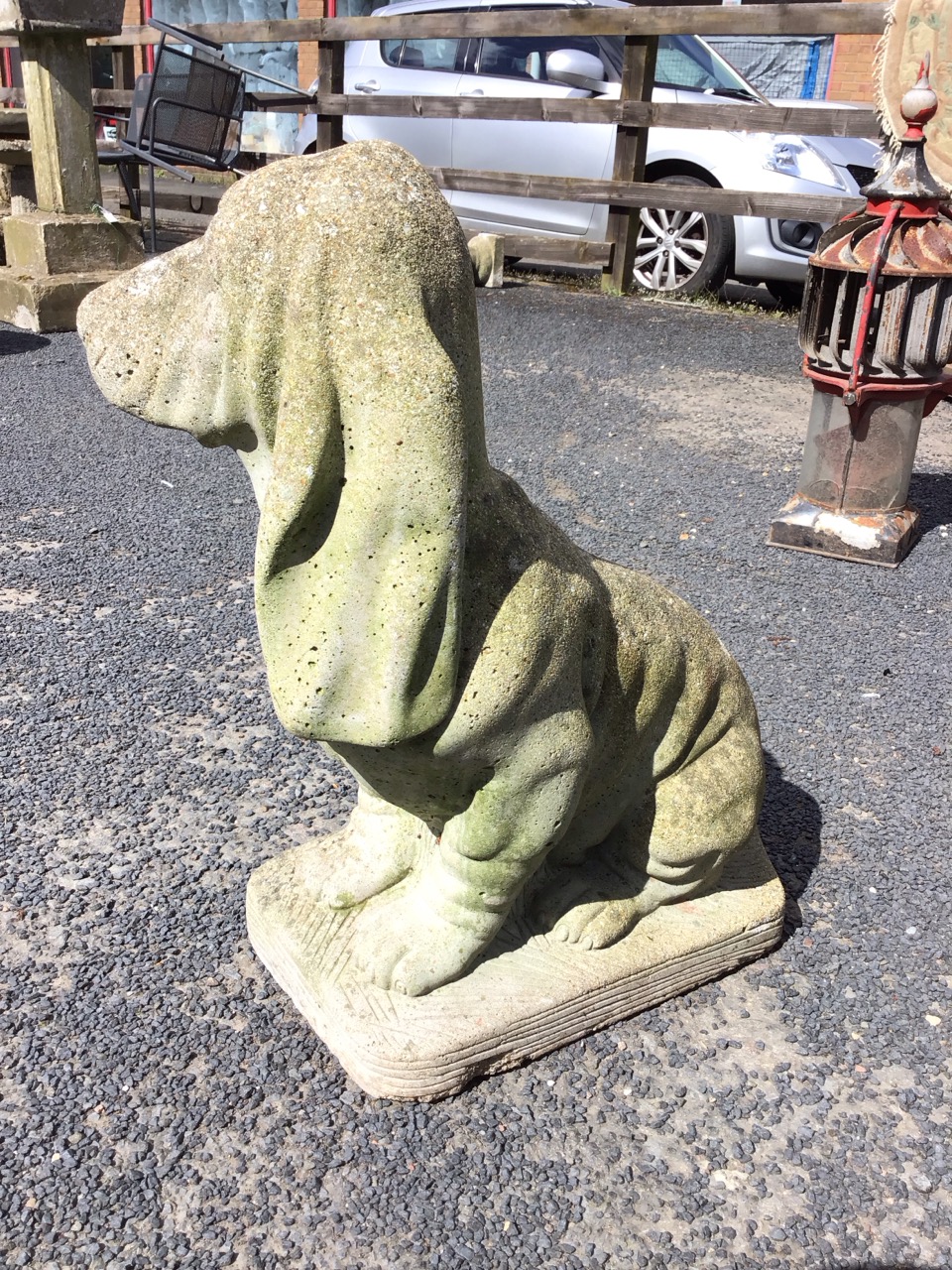 A composition stone basset hound, the animal seated on plinth. (20in) - Image 3 of 3
