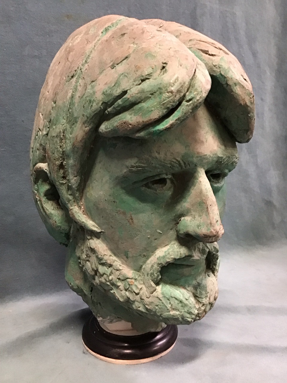 A life sized verdigris patinated composition portrait head of John Entwistle, on a turned ebonised - Image 2 of 3