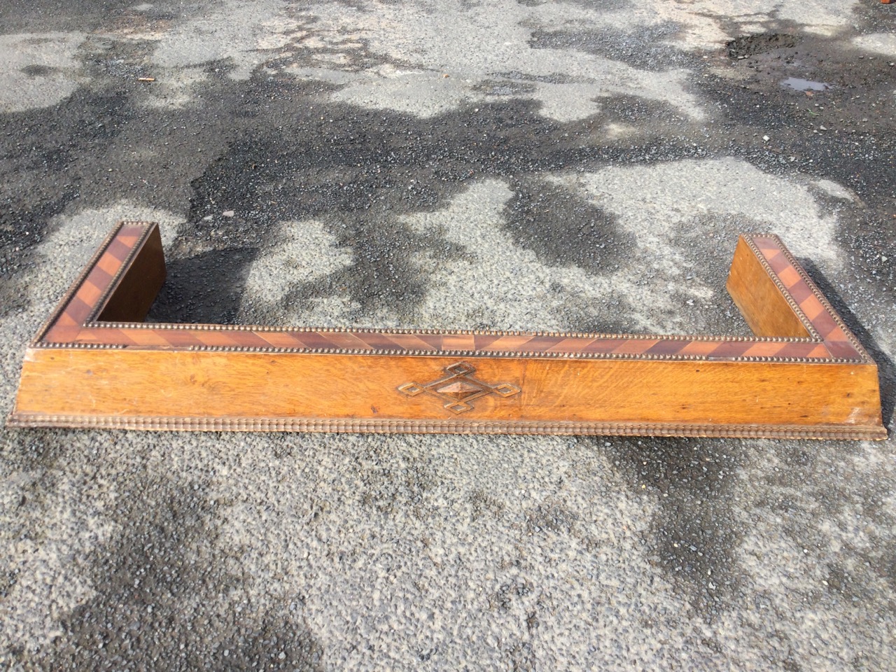 A heavy oak fender with chevron marquetry band framed by beading above an angled apron with ripple- - Image 3 of 3