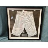 A pair of riding breeches worn by Sam Whaley Cohen in the 2016 Grand National, signed by the