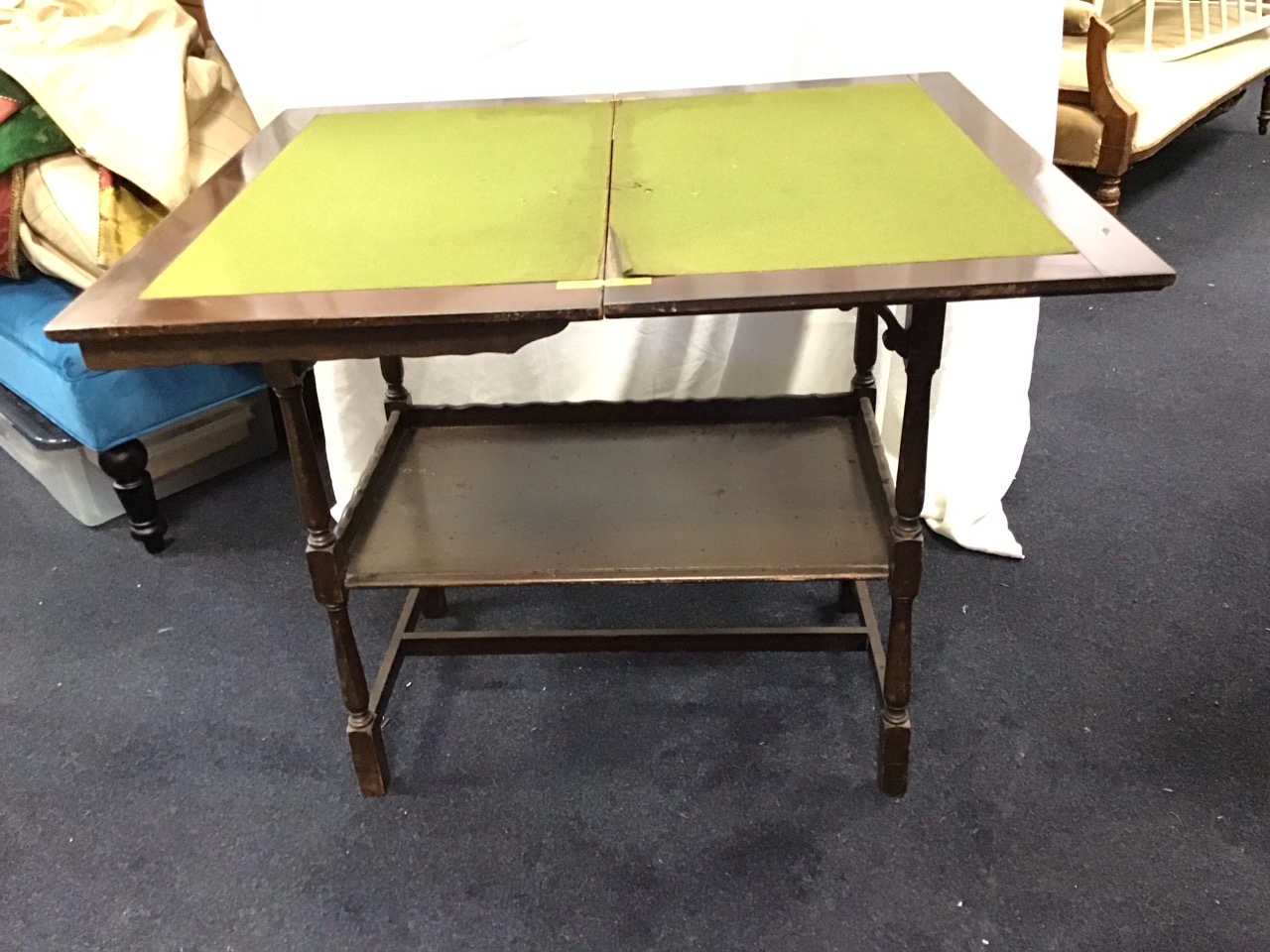 An Edwardian mahogany fold-over card table with rectangular tray top enclosing a baize lined surface - Image 2 of 3