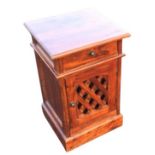 A mahogany bedside cabinet, the moulded rectangular top above a frieze drawer and lattice panelled