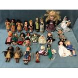 A collection of dolls, mainly in national costumes - Dutch, Welsh, Scottish, a Swiss guard, Māori,