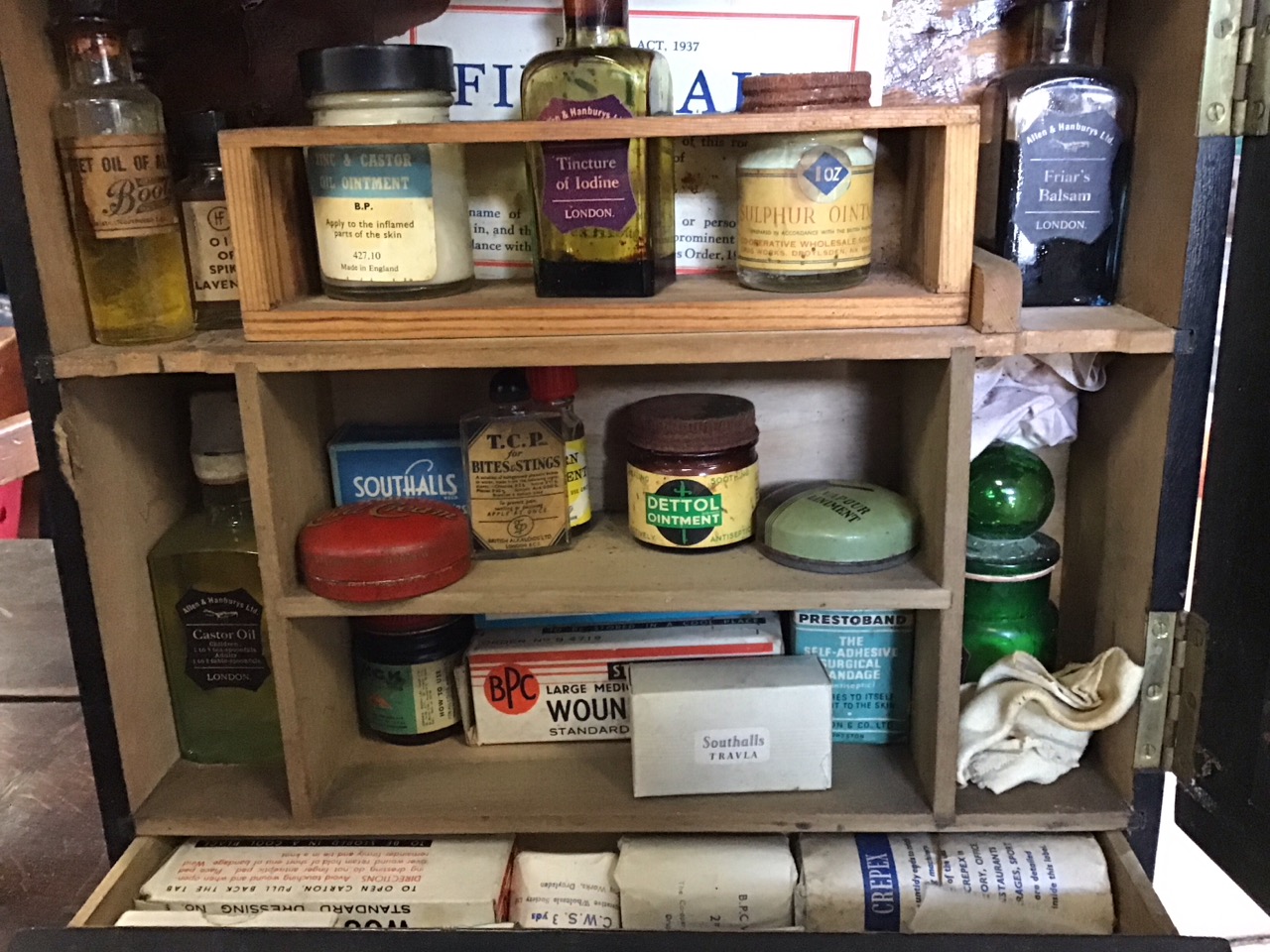 An Edwardian hanging ebonised first aid cabinet - The Lombard, with brass knobbed panelled door - Image 3 of 3