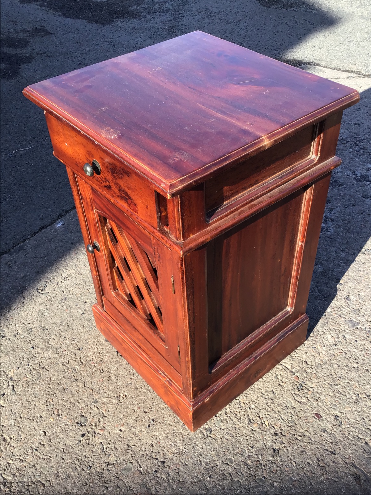 A mahogany bedside cabinet, the moulded rectangular top above a frieze drawer and lattice panelled - Image 2 of 3